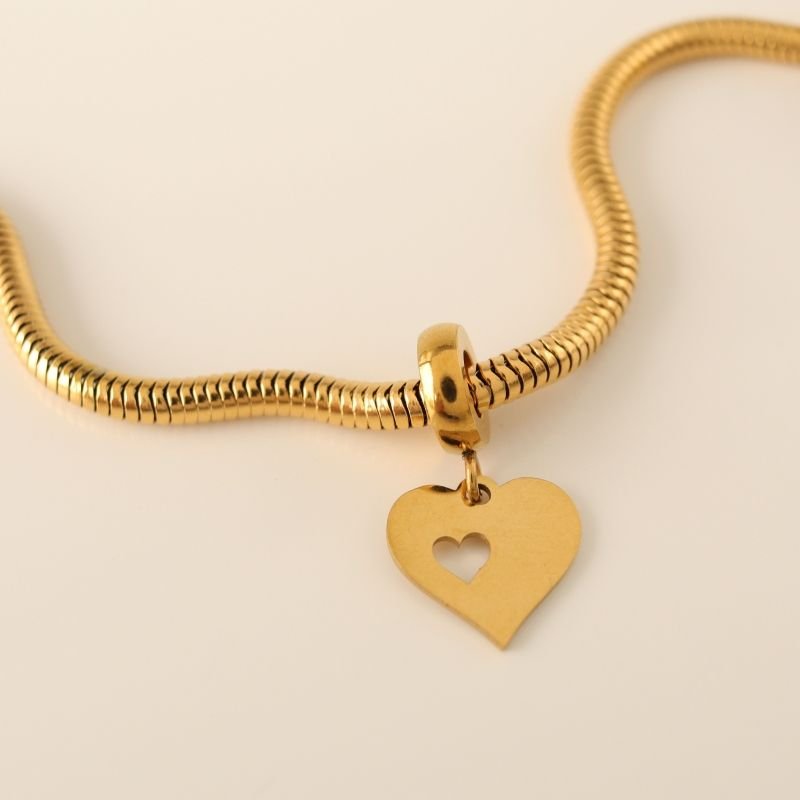 Berloque em Aço Inox Coração com Coração Vazado