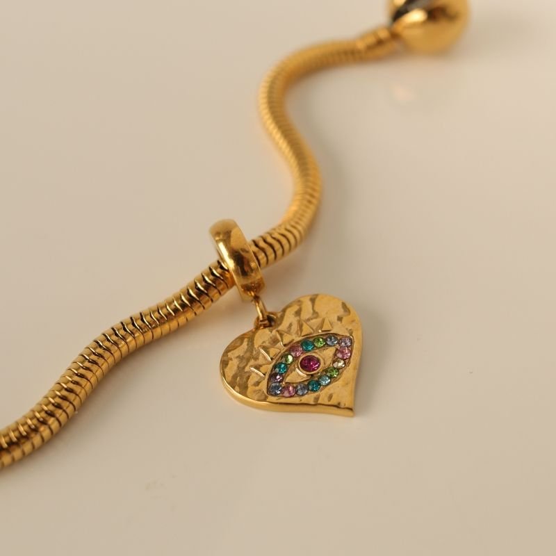 Berloque em Aço Inox Coração com Olho Grego Cravejado