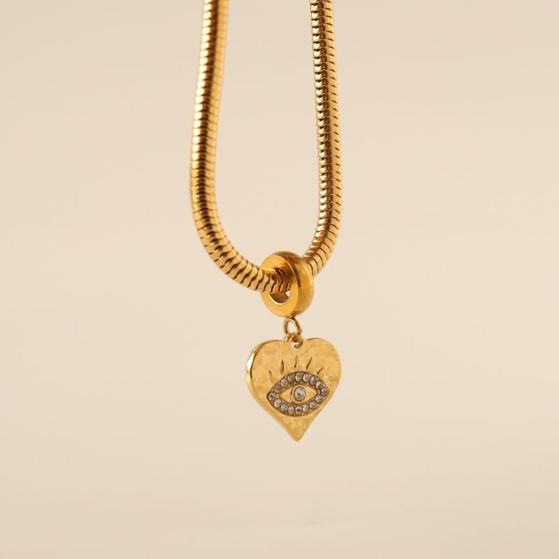 Berloque em Aço Inox Coração com Olho Grego Cravejado