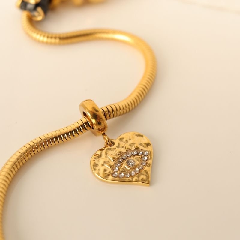 Berloque em Aço Inox Coração com Olho Grego Cravejado