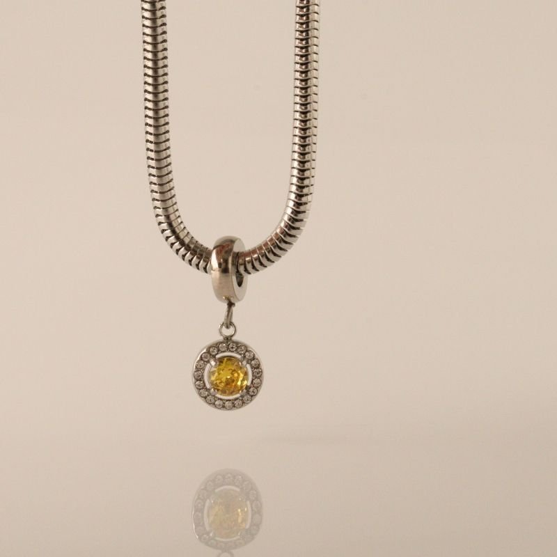 Berloque em Aço Inox Cravejado Amarelo