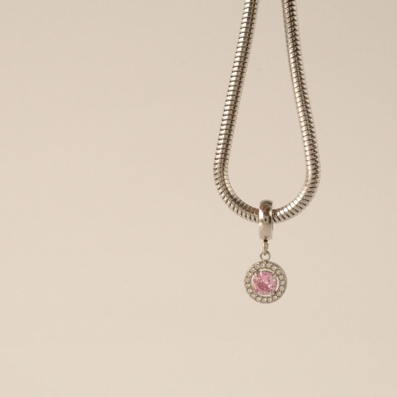 Berloque em Aço Inox Cravejado Rosa Claro