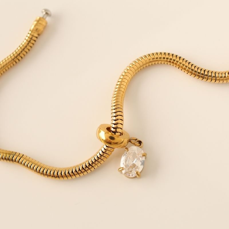 Berloque em Aço Inox Ponto de Luz Cristal