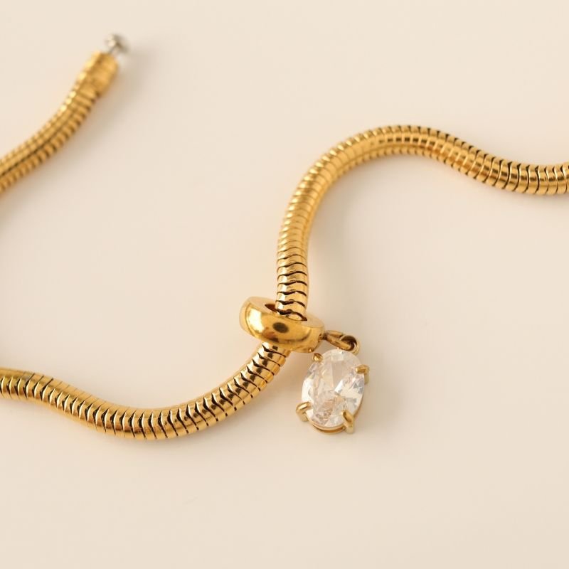 Berloque em Aço Inox Ponto de Luz Cristal