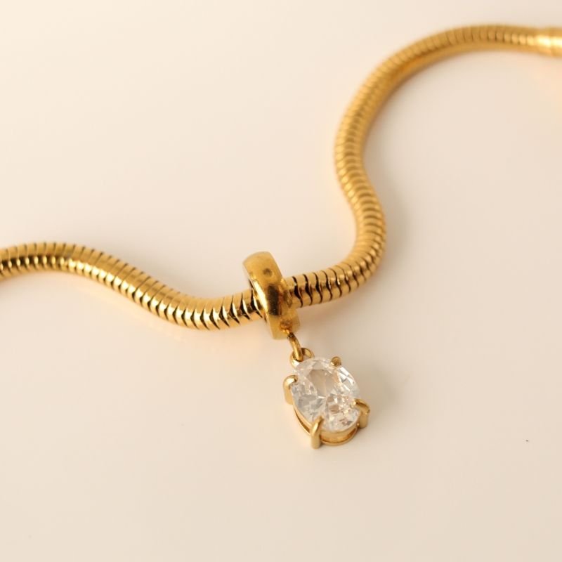 Berloque em Aço Inox Ponto de Luz Cristal