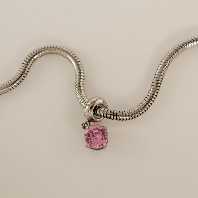 Berloque em Aço Inox Ponto de Luz Rosa