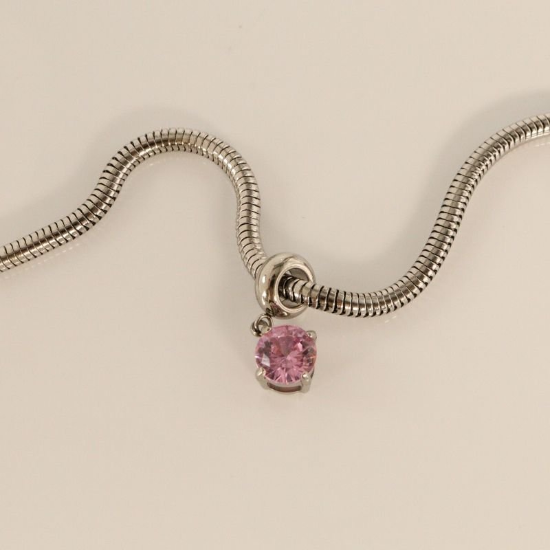 Berloque em Aço Inox Ponto de Luz Rosa