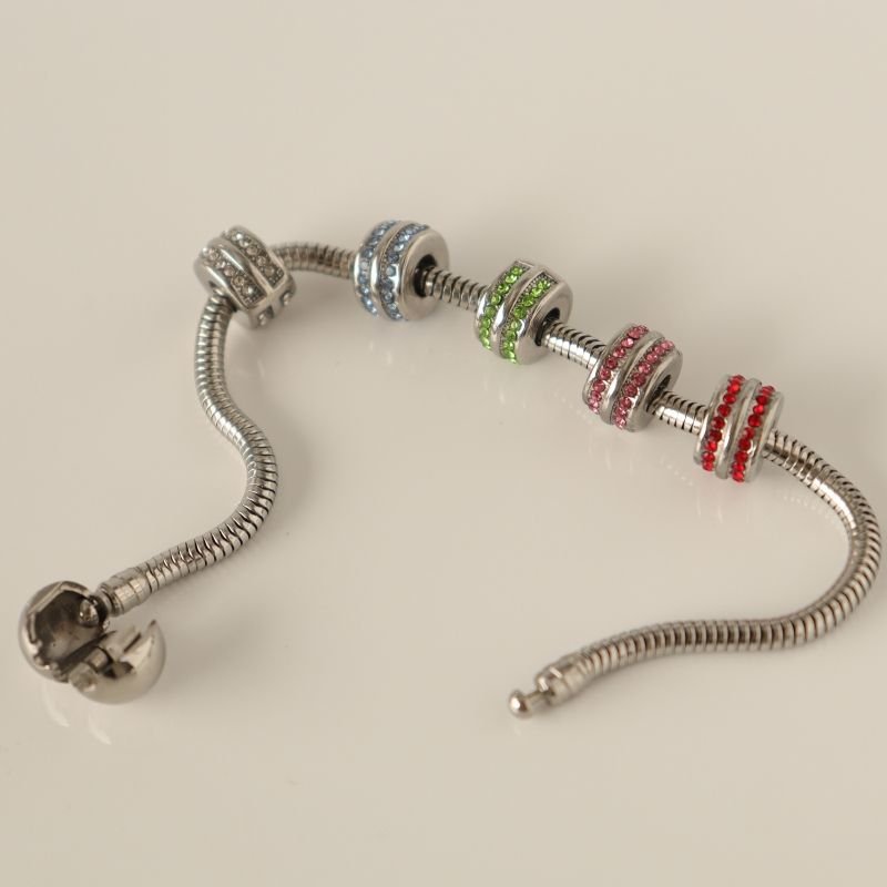 Berloque em Aço Inox Separador Cravejado