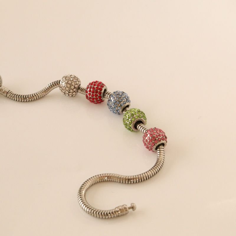 Berloque em Aço Inox Separador Cravejado