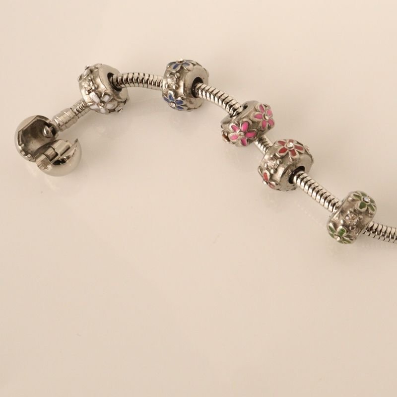 Berloque em Aço Inox Separador Flor Rosa