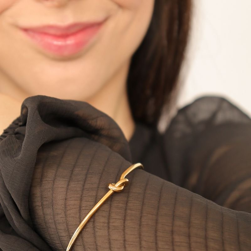 Bracelete Nó Meia Volta em Aço Inox