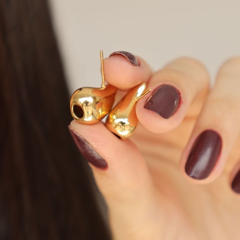 Brinco Gota Moderno com furo embaixo em Aço Inox