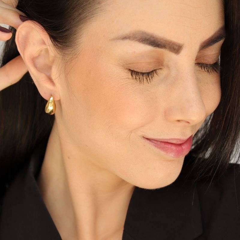 Brinco Gota Moderno com furo embaixo em Aço Inox