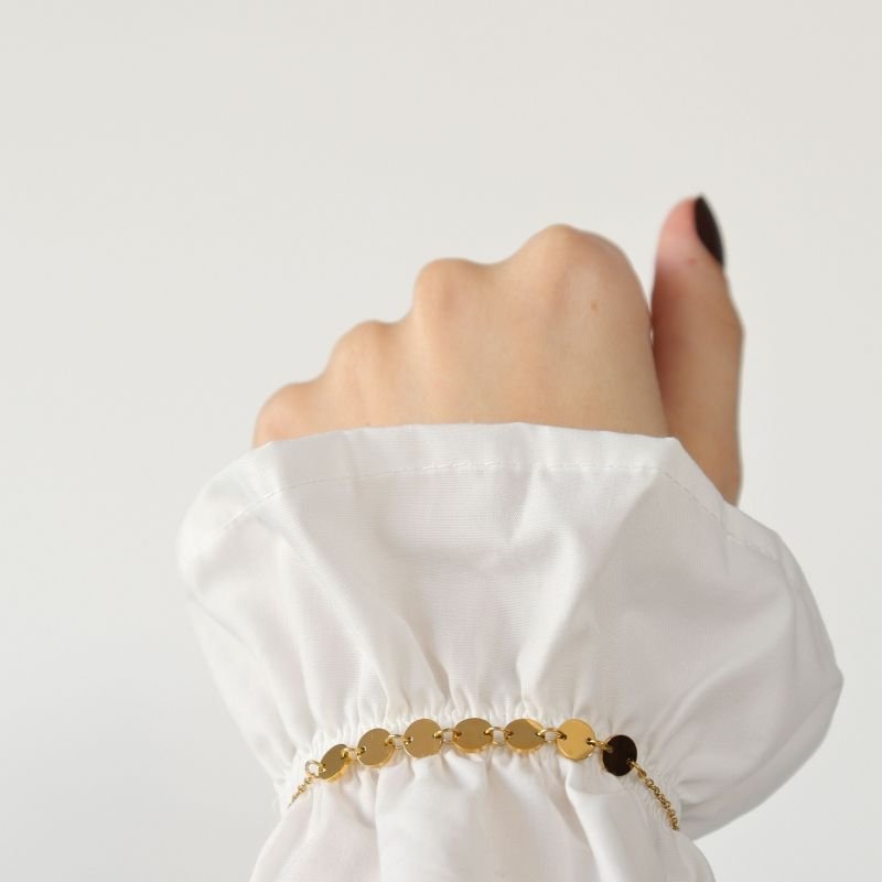 Pulseira com Detalhes em Aço Inox