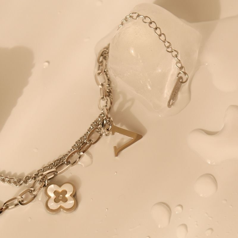 Pulseira com Pingentes em Aço Inox (Linha Premium)